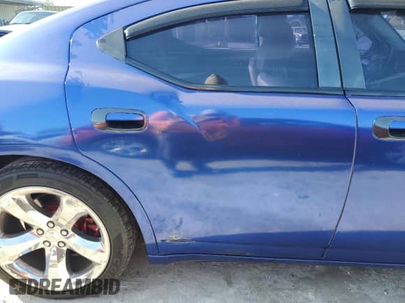 2006 Dodge Charger R/T with VIN 2B3KA53H76H521937, listed as a Copart auction lot 77455534 with 103,060 mi miles and Salvage title. Bid and sale history available at DreamBid. Image 12.