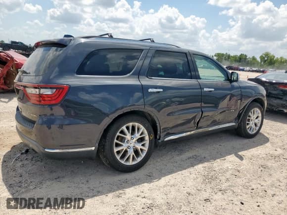 ✅ 2014 Dodge Durango Citadel • VIN: 1C4SDHET7EC975969 • Lot: 70704055. Listed on Copart with 159,802 mi. Free auction sales archive from the USA and detailed vehicle history report at DreamBid. Image 3.