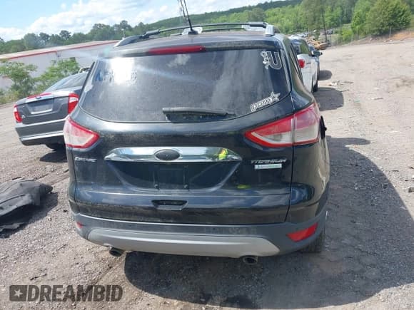 ✅ 2015 Ford Escape Titanium • VIN: 1FMCU0J99FUA73590 • Lot: 42152021. Listed on IAAI with Not provided. Free auction sales archive from the USA and detailed vehicle history report at DreamBid. Image 15.