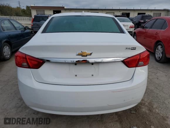 ✅ 2014 Chevrolet Impala LS • VIN: 1G11Y5SL7EU124518 • Лот: 76008184. Опубликован ранее на Copart с пробегом 73 940 миль. Бесплатный доступ к архиву аукционных продаж из США и подробный отчёт об истории автомобиля на DreamBid. Изображение 6.