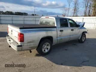 2009 Dodge Dakota ST z VIN 1D7HE28K99S785406, wystawiony jako Copart lot #40571034 z przebiegiem 161 444 mil mil oraz Szkoda całkowita • Salvage title. Historia ofert i sprzedaży dostępna na DreamBid. Obrazek 3.