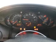 ✅ 1999 Porsche 911 • VIN: WP0AA2996XS626066 • Lot: 54054855. Listed on Copart with 152,153 mi. Free auction sales archive from the USA and detailed vehicle history report at DreamBid. Image 9.