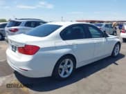 ✅ 2015 BMW 3 Series 328i • VIN: WBA3C1C52FP852932 • Lot: 42935008. Listed on IAAI with 136,082 mi. Free auction sales archive from the USA and detailed vehicle history report at DreamBid. Image 4.