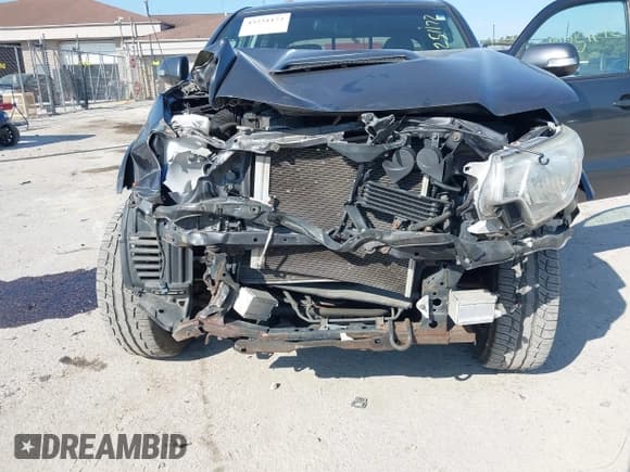 ✅ 2013 Toyota Tacoma • VIN: 3TMLU4EN2DM129101 • Lot: 43251172. Listed on IAAI with 171,384 mi. Free auction sales archive from the USA and detailed vehicle history report at DreamBid. Image 6.