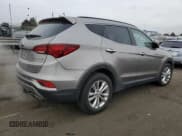 ✅ 2018 Hyundai Santa Fe Limited • VIN: 5XYZUDLA0JG519441 • Лот: 82035893. Опубликован ранее на Copart с пробегом 69 802 миль. Бесплатный доступ к архиву аукционных продаж из США и подробный отчёт об истории автомобиля на DreamBid. Изображение 3.