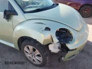 ✅ 2009 Volkswagen Beetle S • VIN: 3VWRF31Y29M410351 • Lot: 41664817. Wystawiony na IAAI z przebiegiem 78 878 mil. Bezpłatny archiwum sprzedaży aukcyjnych z USA i szczegółowy raport historii pojazdu na DreamBid. Zdjęcie 6.