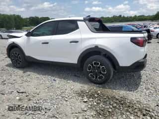 2024 Hyundai Santa Cruz SEL z VIN 5NTJBDAE7RH083654, wystawiony jako Copart lot #57636384 z przebiegiem 11 528 mil mil oraz Szkoda całkowita • Salvage title. Historia ofert i sprzedaży dostępna na DreamBid. Obrazek 2.