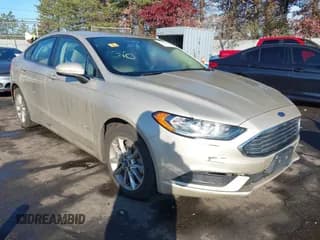 ✅ 2017 Ford Fusion Hybrid S • VIN: 3FA6P0UU0HR196476 • Lot: 43717283. Listed on IAAI with 107,347 mi. Free auction sales archive from the USA and detailed vehicle history report at DreamBid. Image 1.