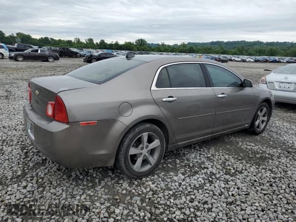 ✅ 2012 Chevrolet Malibu 1LT • VIN: 1G1ZC5E06CF323953 • Lot: 57441024. Listed on Copart with 153,627 mi. Free auction sales archive from the USA and detailed vehicle history report at DreamBid. Image 3.
