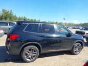 ✅ 2023 Honda Passport EX-L • VIN: 5FNYF8H54PB013071 • Lot: 43246503. Listed on IAAI with 35,120 mi. Free auction sales archive from the USA and detailed vehicle history report at DreamBid. Image 13.