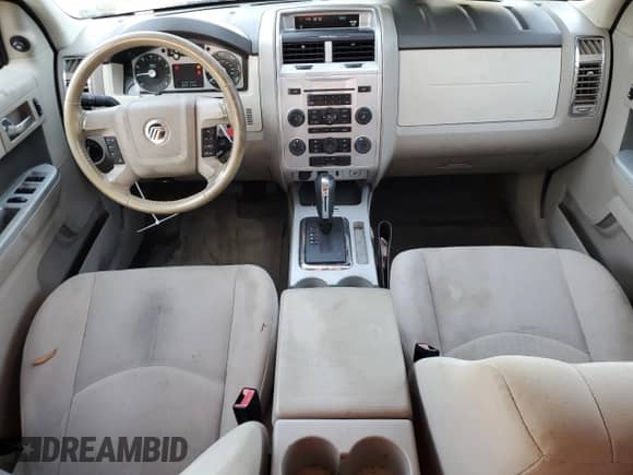 2011 Mercury Mariner z VIN 4M2CN8B72BKJ04014, wystawiony jako Copart lot #44919685 z przebiegiem 101 063 mil mil oraz Szkoda całkowita • Salvage title. Historia ofert i sprzedaży dostępna na DreamBid. Obrazek 8.