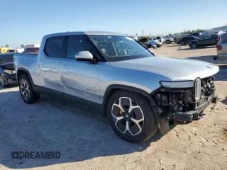 ✅ 2023 Rivian R1T Adventure • VIN: 7FCTGAAA3PN020577 • Lot: 84847414. Listed on Copart with 7,888 mi. Free auction sales archive from the USA and detailed vehicle history report at DreamBid. Image 4.
