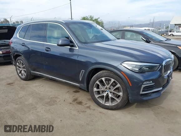 ✅ 2021 BMW X5 sDrive40i • VIN: 5UXCR4C06M9F26786 • Lot: 42254169. Listed on IAAI with 103,213 mi. Free auction sales archive from the USA and detailed vehicle history report at DreamBid. Image 1.