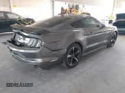 ✅ 2021 Ford Mustang EcoBoost • VIN: 1FA6P8TH4M5114569 • Lot: 43376525. Listed on IAAI with 22,091 mi. Free auction sales archive from the USA and detailed vehicle history report at DreamBid. Image 4.