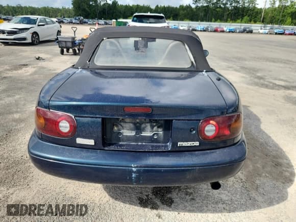 ✅ 1996 Mazda MX-5 Miata • VIN: JM1NA3531T0700220 • Лот: 65318945. Опубликован ранее на Copart с пробегом 210 472 миль. Бесплатный доступ к архиву аукционных продаж из США и подробный отчёт об истории автомобиля на DreamBid. Изображение 6.