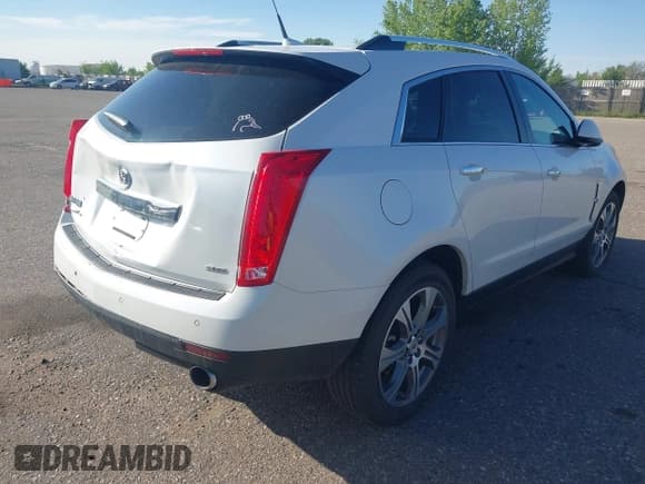 ✅ 2012 Cadillac SRX Performance Collection • VIN: 3GYFNEE30CS652829 • Lot: 42156961. Wystawiony na IAAI z przebiegiem 106 473 mil. Bezpłatny archiwum sprzedaży aukcyjnych z USA i szczegółowy raport historii pojazdu na DreamBid. Zdjęcie 4.