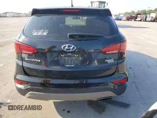 ✅ 2018 Hyundai Santa Fe 2.4L • VIN: 5NMZTDLB6JH085642 • Лот: 61543523. Опубликован ранее на Copart с пробегом 128 650 миль. Бесплатный доступ к архиву аукционных продаж из США и подробный отчёт об истории автомобиля на DreamBid. Изображение 6.
