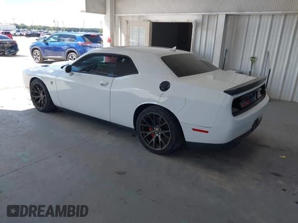 ✅ 2016 Dodge Challenger SRT Hellcat • VIN: 2C3CDZC99GH200224 • Lot: 43442618. Wystawiony na IAAI z przebiegiem 56 715 mil. Bezpłatny archiwum sprzedaży aukcyjnych z USA i szczegółowy raport historii pojazdu na DreamBid. Zdjęcie 3.