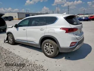 ✅ 2019 Hyundai Santa Fe SEL • VIN: 5NMS33AD2KH088281 • Лот: 80778475. Опубликован ранее на Copart с пробегом 105 969 миль. Бесплатный доступ к архиву аукционных продаж из США и подробный отчёт об истории автомобиля на DreamBid. Изображение 2.