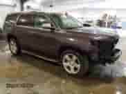 2016 Chevrolet Tahoe LTZ with VIN 1GNSKCKC5GR107425, listed as a Copart auction lot 81219225 with 130,322 mi miles and Salvage title. Bid and sale history available at DreamBid. Image 4.