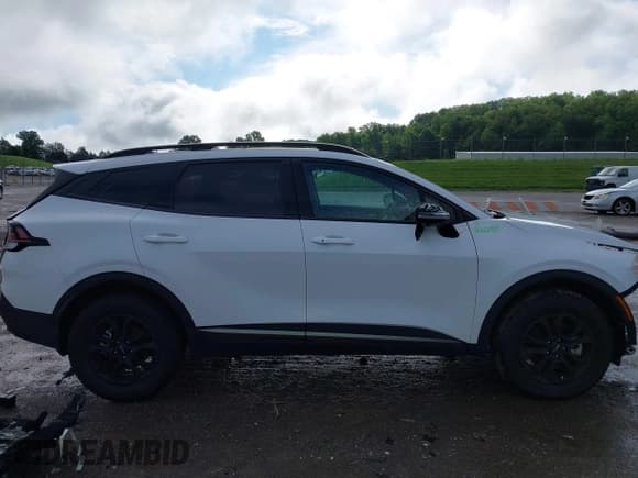 ✅ 2023 Kia Sportage X-Pro Prestige • VIN: 5XYK7CAF6PG135612 • Lot: 42244280. Listed on IAAI with 7,084 mi. Free auction sales archive from the USA and detailed vehicle history report at DreamBid. Image 14.