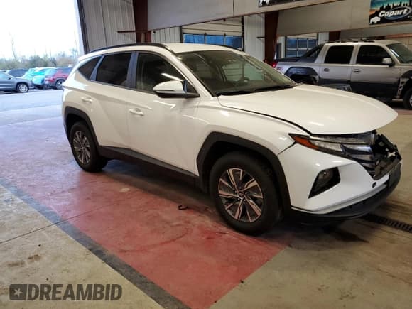 ✅ 2022 Hyundai Tucson Blue • VIN: KM8JBCA12NU025338 • Lot: 70356943. Wystawiony na Copart z przebiegiem 30 420 mil. Bezpłatny archiwum sprzedaży aukcyjnych z USA i szczegółowy raport historii pojazdu na DreamBid. Zdjęcie 4.