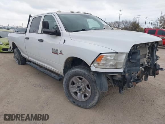 ✅ 2017 Ram 2500 Tradesman • VIN: 3C6UR5HL3HG519898 • Lot: 41707036. Listed on IAAI with 176,928 mi. Free auction sales archive from the USA and detailed vehicle history report at DreamBid. Image 1.