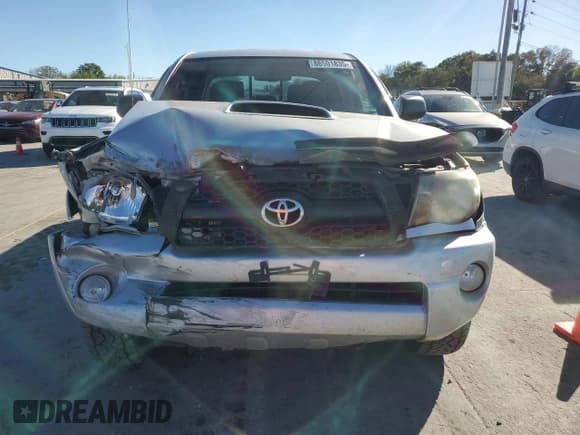 ✅ 2011 Toyota Tacoma • VIN: 3TMLU4EN2BM065428 • Lot: 86501835. Listed on Copart with 122,838 mi. Free auction sales archive from the USA and detailed vehicle history report at DreamBid. Image 5.