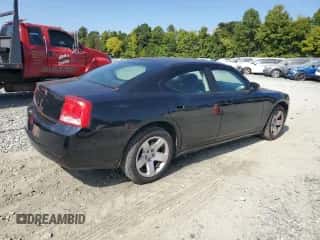 2010 Dodge Charger Police с VIN 2B3AA4CT2AH203453, выставлен на аукционе Copart как лот 69824824 с пробегом 195 153 миль миль и Списание • Salvage title. История ставок и продаж доступна на DreamBid. Изображение 3.