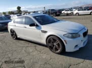 ✅ 2013 BMW M5 • VIN: WBSFV9C51DC772446 • Lot: 85179955. Listed on Copart with 152,954 mi. Free auction sales archive from the USA and detailed vehicle history report at DreamBid. Image 4.