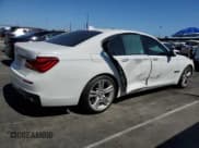 ✅ 2015 BMW 7 Series 750i • VIN: WBAYA8C53FG197751 • Lot: 56249135. Listed on Copart with 98,514 mi. Free auction sales archive from the USA and detailed vehicle history report at DreamBid. Image 3.