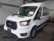 ✅ 2023 Ford Transit Passenger XL • VIN: 1FBAX2C89PKA94069 • Lot: 43006053. Listed on IAAI with 68,997 mi. Free auction sales archive from the USA and detailed vehicle history report at DreamBid. Image 2.