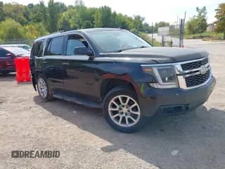 2015 Chevrolet Tahoe LT z VIN 1GNSKBKC9FR158211, wystawiony jako IAAI lot #43094500 z przebiegiem 221 133 mil mil oraz . Historia ofert i sprzedaży dostępna na DreamBid. Obrazek 1.