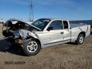 1998 Dodge Dakota SLT z VIN 1B7GL22Y6WS549252, wystawiony jako Copart lot #86925244 z przebiegiem 246 913 mil mil oraz Szkoda całkowita • Salvage title. Historia ofert i sprzedaży dostępna na DreamBid. Obrazek 1.