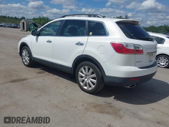 ✅ 2010 Mazda CX-9 Touring • VIN: JM3TB3MV5A0232035 • Lot: 42622694. Listed on IAAI with 103,024 mi. Free auction sales archive from the USA and detailed vehicle history report at DreamBid. Image 3.