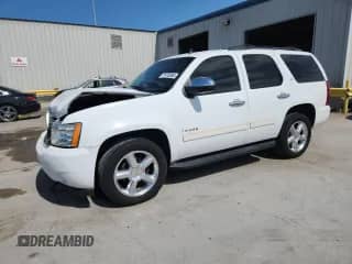 2011 Chevrolet Tahoe LT with VIN 1GNSCBE02BR272348, listed as a Copart auction lot 71478085 with 310,706 mi miles and Salvage title. Bid and sale history available at DreamBid. Image 1.