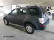 2009 Mercury Mariner Premier with VIN 4M2CU877X9KJ14960, listed as a Copart auction lot 62951805 with 131,255 mi miles and Salvage title. Bid and sale history available at DreamBid. Image 2.