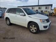 ✅ 2013 Suzuki Grand Vitara Premium • VIN: JS3TE0D62D4100002 • Lot: 51343635. Listed on Copart with 157,080 mi. Free auction sales archive from the USA and detailed vehicle history report at DreamBid. Image 4.
