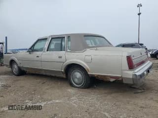✅ 1989 Lincoln Town Car • VIN: 1LNBM81F5KY790569 • Lot: 86815844. Listed on Copart with 28,022 mi. Free auction sales archive from the USA and detailed vehicle history report at DreamBid. Image 2.