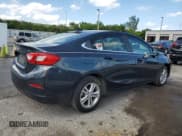 ✅ 2018 Chevrolet Cruze LT • VIN: 1G1BE5SM9J7151525 • Lot: 57808323. Listed on Copart with 101,077 mi. Free auction sales archive from the USA and detailed vehicle history report at DreamBid. Image 3.