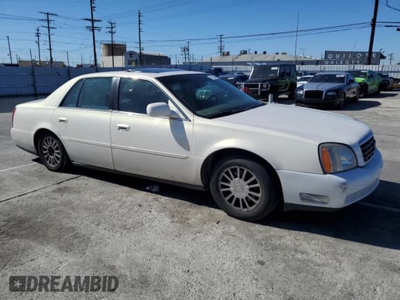 ✅ 2004 Cadillac DeVille DHS • VIN: 1G6KE57YX4U218189 • Lot: 49122094. Listed on Copart with 182,511 mi. Free auction sales archive from the USA and detailed vehicle history report at DreamBid. Image 4.