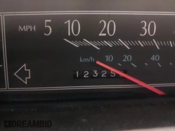 ✅ 1992 Cadillac DeVille • VIN: 1G6CD53B2N4227608 • Lot: 42190714. Listed on IAAI with 123,256 mi. Free auction sales archive from the USA and detailed vehicle history report at DreamBid. Image 7.