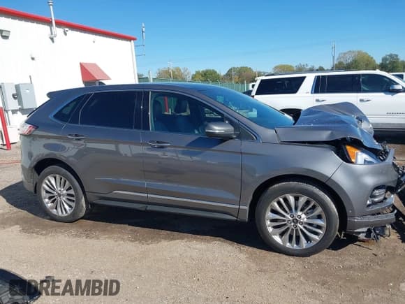 ✅ 2022 Ford Edge Titanium • VIN: 2FMPK4K99NBA38498 • Lot: 43569970. Wystawiony na IAAI z przebiegiem 10 405 mil. Bezpłatny archiwum sprzedaży aukcyjnych z USA i szczegółowy raport historii pojazdu na DreamBid. Zdjęcie 14.