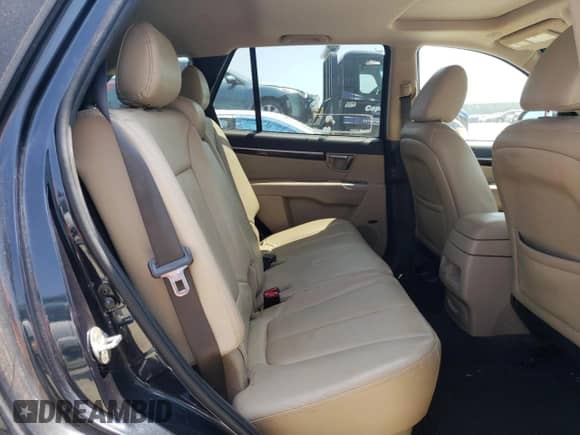 2011 Hyundai Santa Fe Limited с VIN 5XYZK4AG0BG056781, выставлен на аукционе Copart как лот 69202724 с пробегом 244 892 миль миль и Списание • Salvage title. История ставок и продаж доступна на DreamBid. Изображение 11.