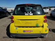 ✅ 2013 Smart fortwo Pure • VIN: WMEEJ3BA0DK661968 • Лот: 82252405. Опубликован ранее на Copart с пробегом 80 533 миль. Бесплатный доступ к архиву аукционных продаж из США и подробный отчёт об истории автомобиля на DreamBid. Изображение 6.