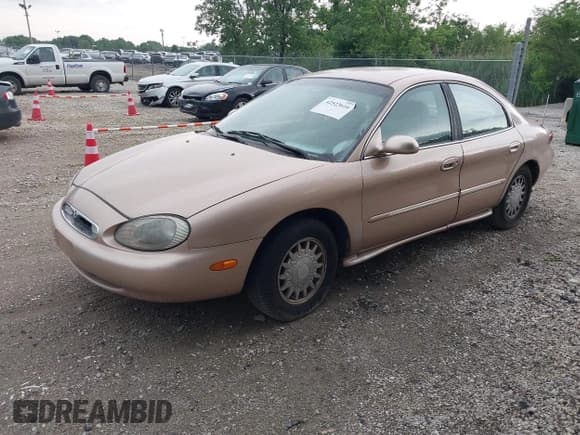 ✅ 1996 Mercury Sable LS • VIN: 1MELM53S1TG638988 • Лот: 42523616. Опубликован ранее на IAAI с пробегом 87 087 миль. Бесплатный доступ к архиву аукционных продаж из США и подробный отчёт об истории автомобиля на DreamBid. Изображение 2.