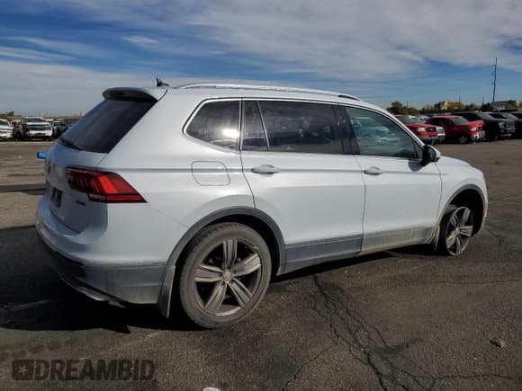 ✅ 2019 Volkswagen Tiguan SEL Premium • VIN: 3VV4B7AX4KM062258 • Лот: 91467365. Опубликован ранее на Copart с пробегом 85 049 миль. Бесплатный доступ к архиву аукционных продаж из США и подробный отчёт об истории автомобиля на DreamBid. Изображение 3.