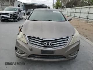 ✅ 2013 Hyundai Azera • VIN: KMHFH4JG6DA231521 • Лот: 50327805. Опубликован ранее на Copart с пробегом 176 041 миль. Бесплатный доступ к архиву аукционных продаж из США и подробный отчёт об истории автомобиля на DreamBid. Изображение 5.