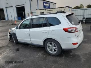 ✅ 2012 Hyundai Santa Fe SE • VIN: 5XYZH4AG2CG097607 • Lot: 79174504. Listed on Copart with 120,830 mi. Free auction sales archive from the USA and detailed vehicle history report at DreamBid. Image 2.