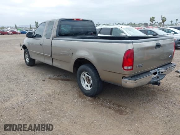 ✅ 2001 Ford F-150 XL • VIN: 1FTRX17W21NB19028 • Lot: 42354428. Listed on IAAI with 189,824 mi. Free auction sales archive from the USA and detailed vehicle history report at DreamBid. Image 3.